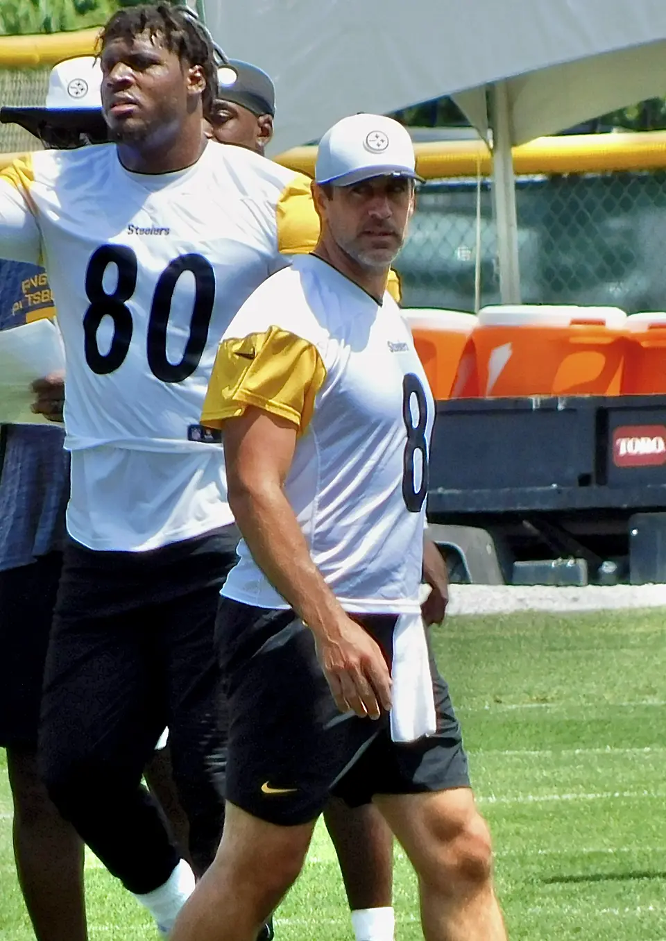Aaron Rodgers in a Pittsburgh Steelers uniform on the sideline